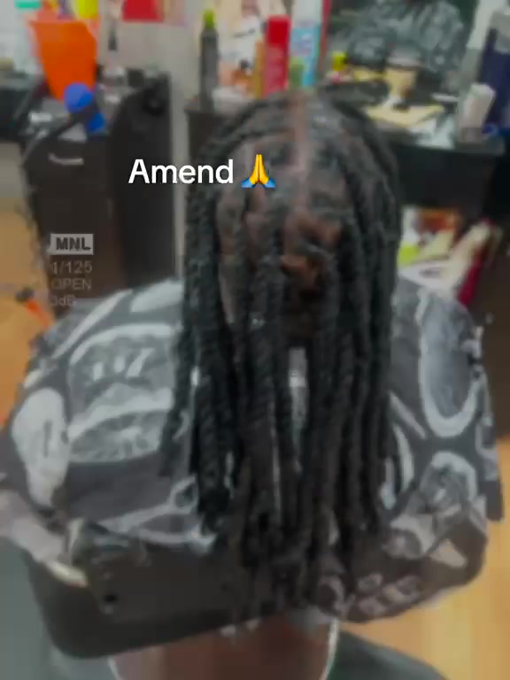 Loc retwist by Joy